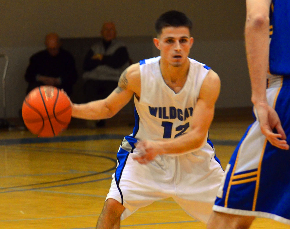 Wildcats Catch Fire for First Victory, 102-98 Over Utica
